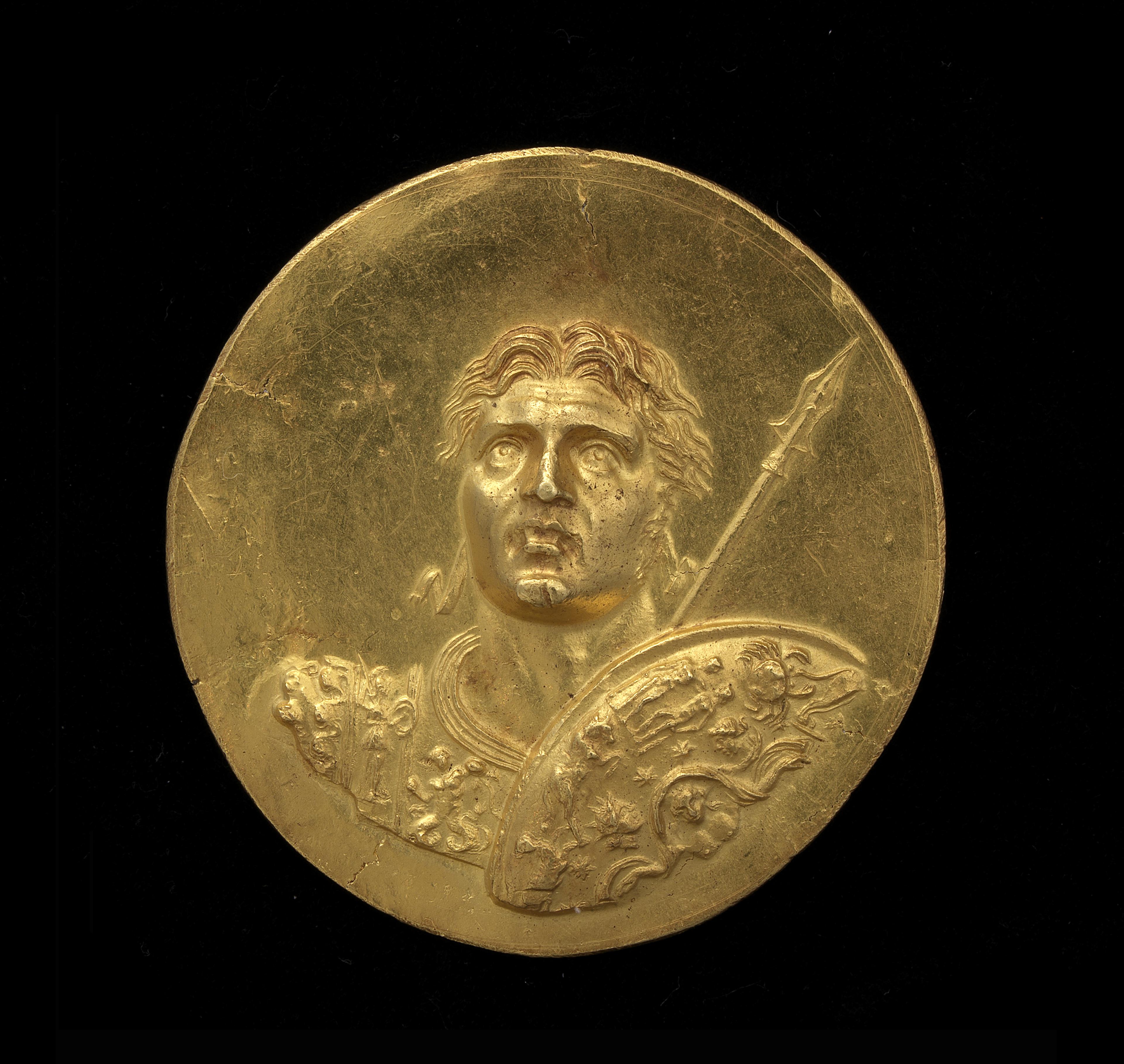 Busto couraçado de Alexandre, de frente, com diadema e escudo circular